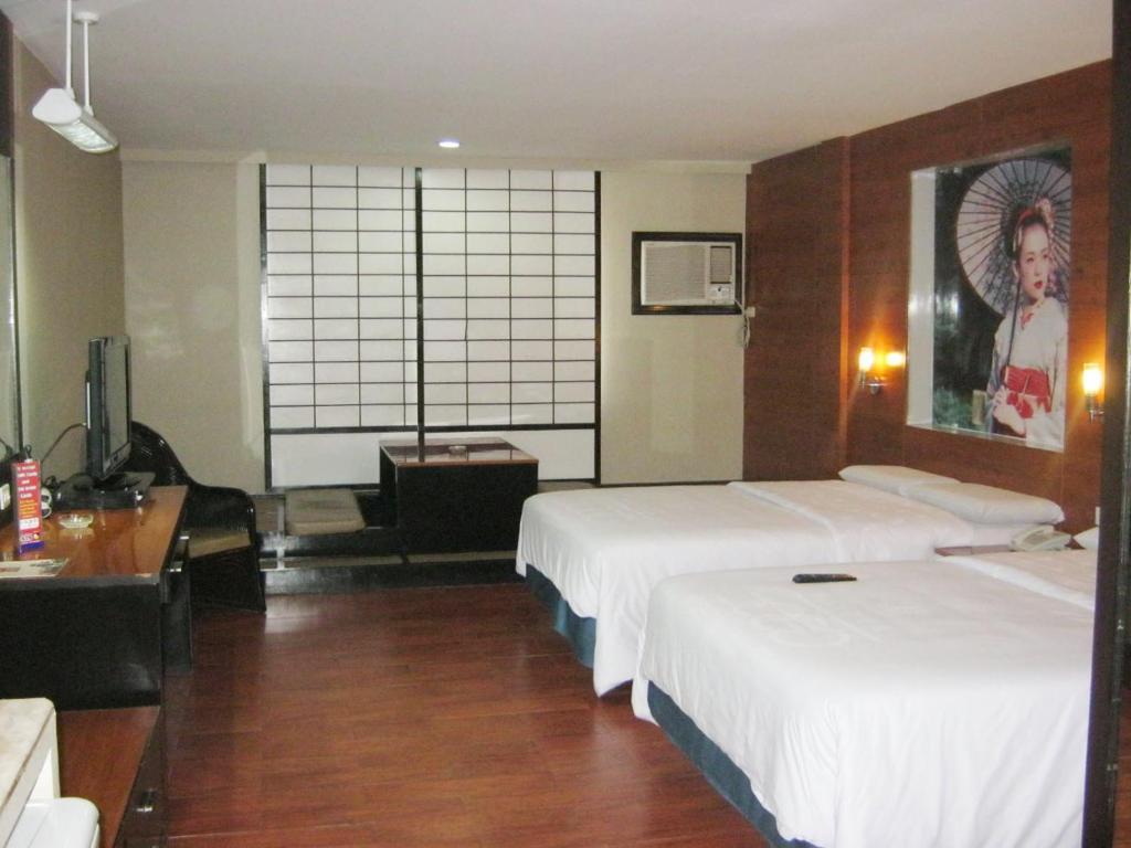 Hotel Sogo Malate Манила Стая снимка